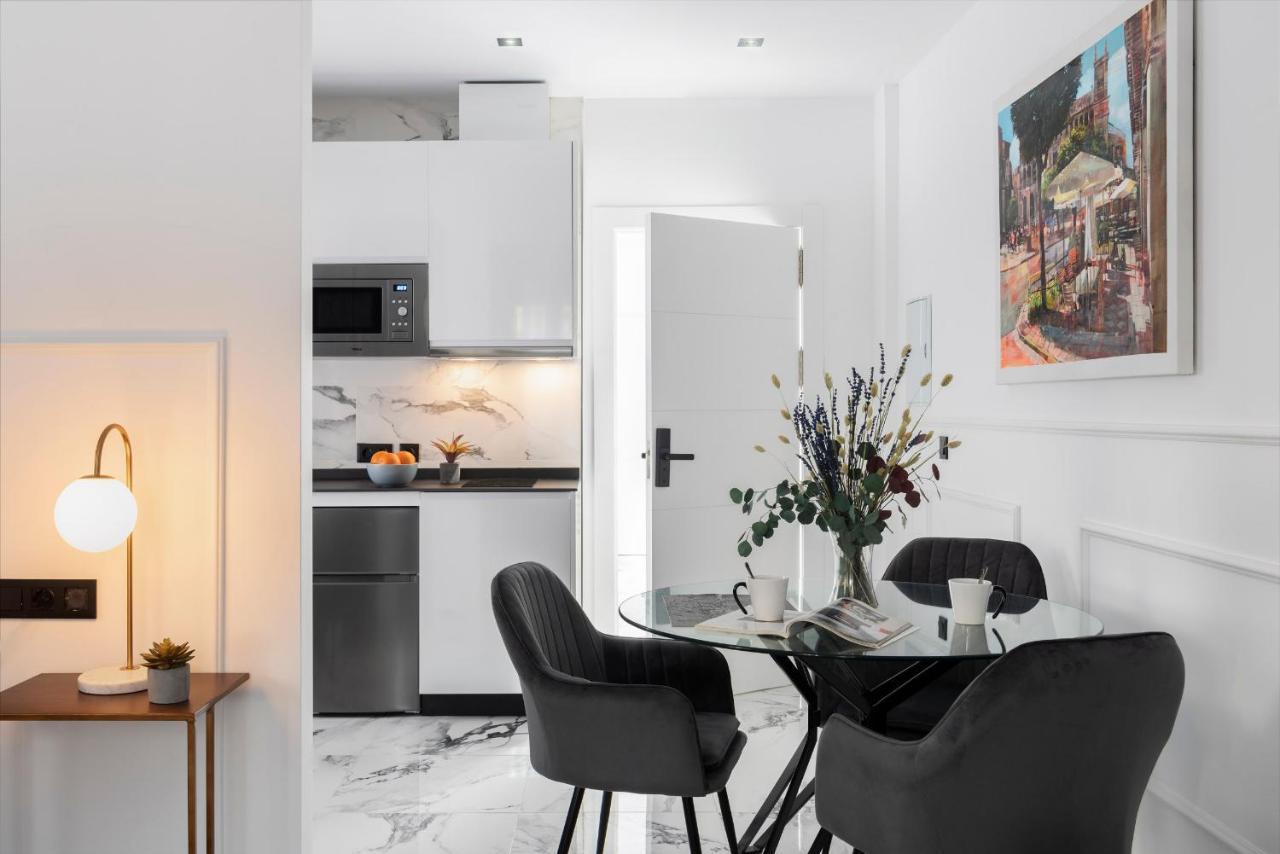 Quivir Apartamentos Deluxe Casa Del Arco Andujar Bagian luar foto