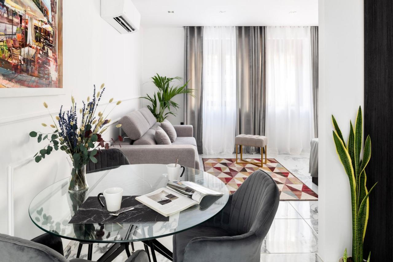 Quivir Apartamentos Deluxe Casa Del Arco Andujar Bagian luar foto