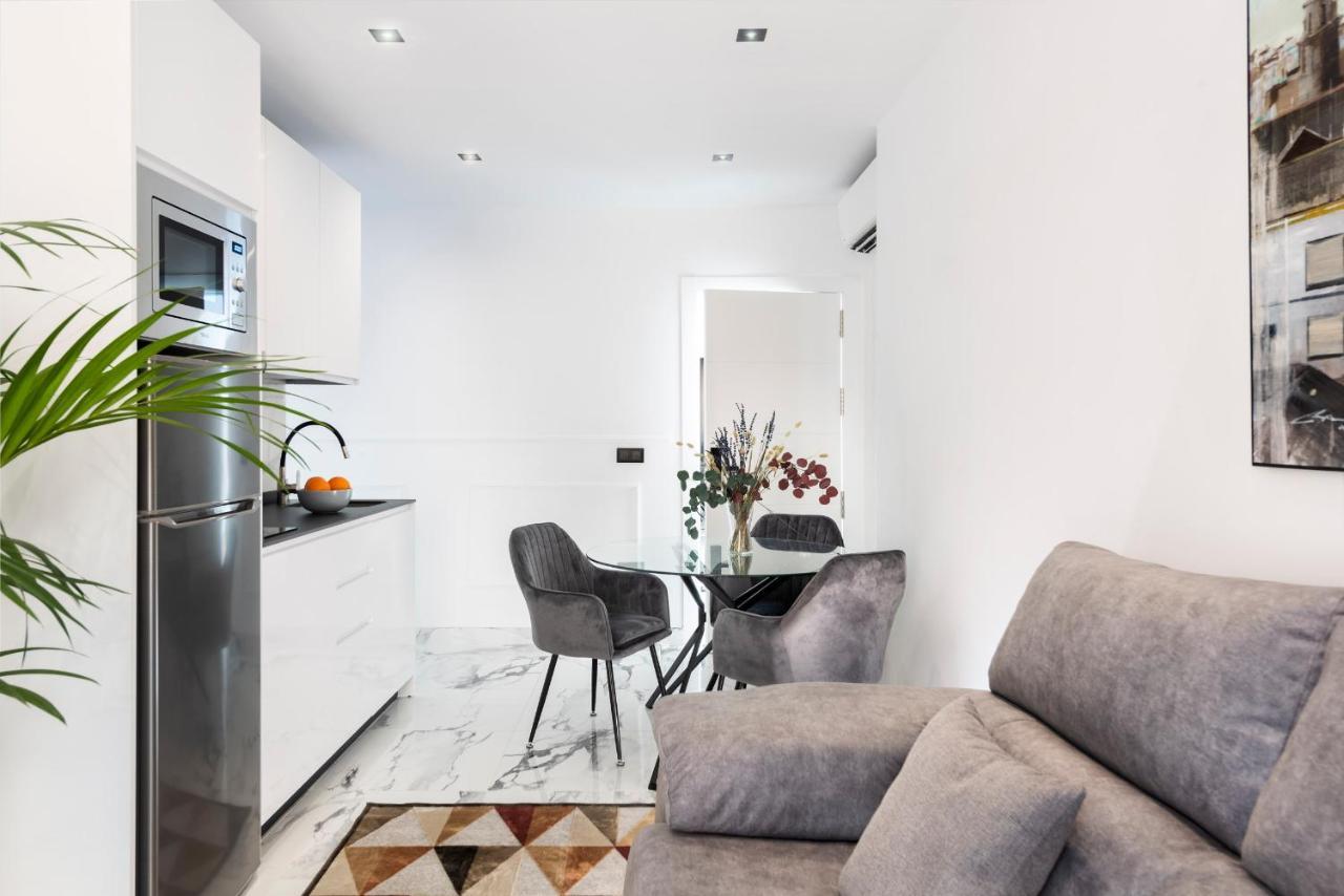 Quivir Apartamentos Deluxe Casa Del Arco Andujar Bagian luar foto