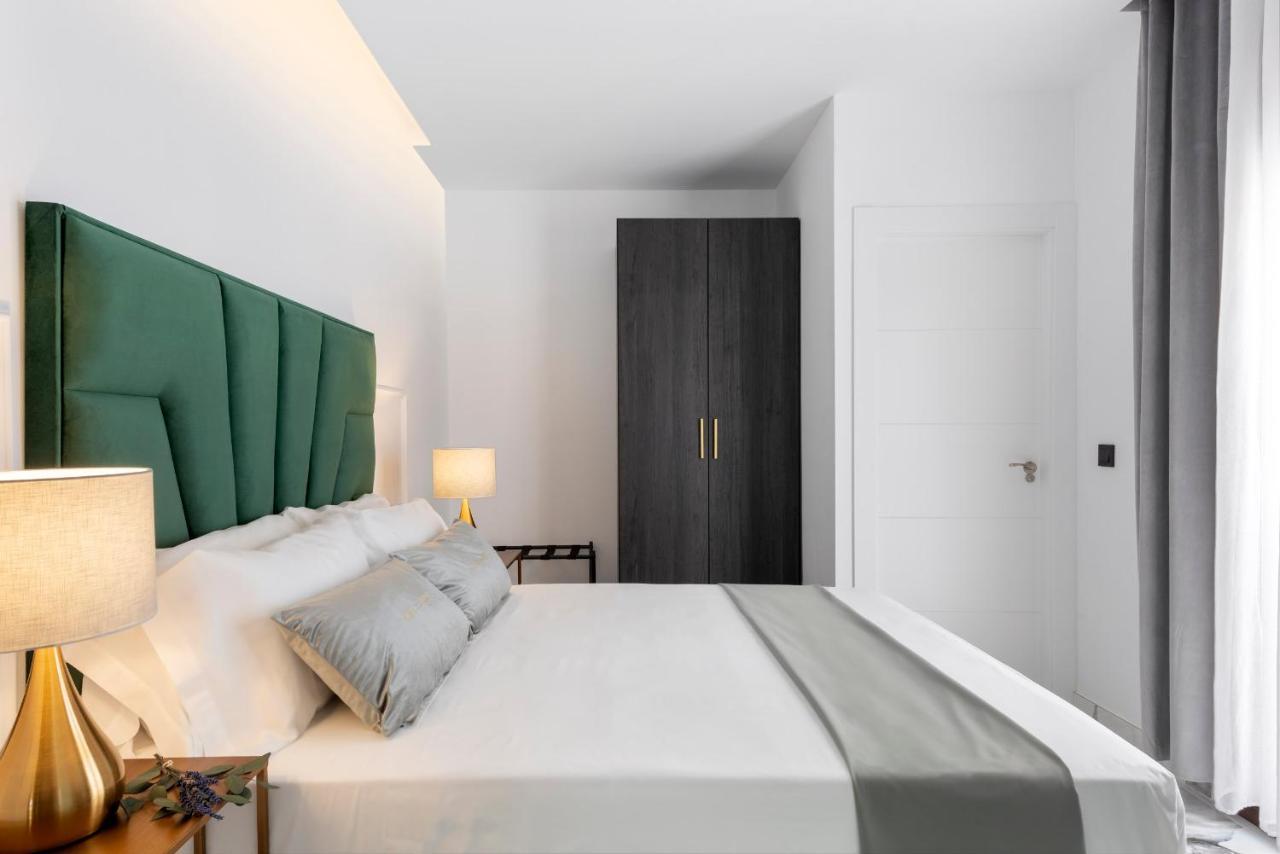 Quivir Apartamentos Deluxe Casa Del Arco Andujar Bagian luar foto