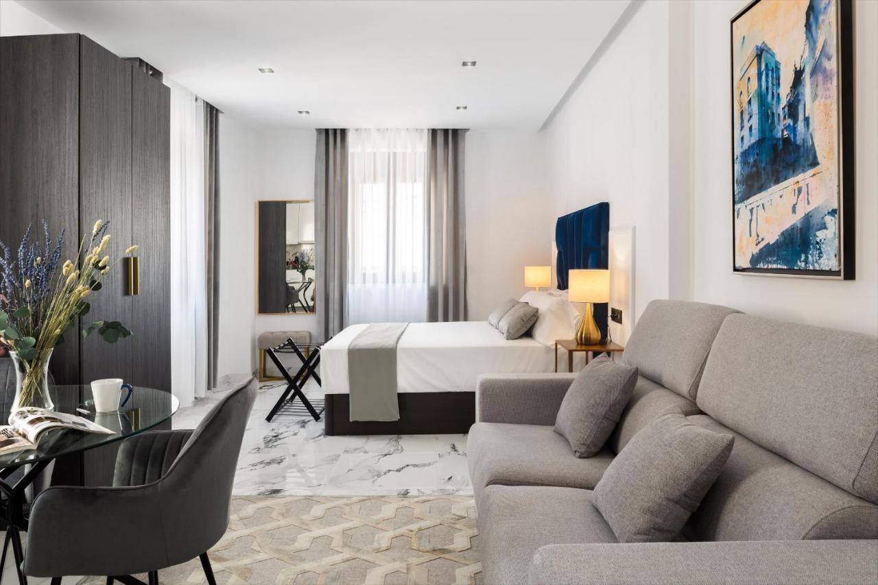 Quivir Apartamentos Deluxe Casa Del Arco Andujar Bagian luar foto