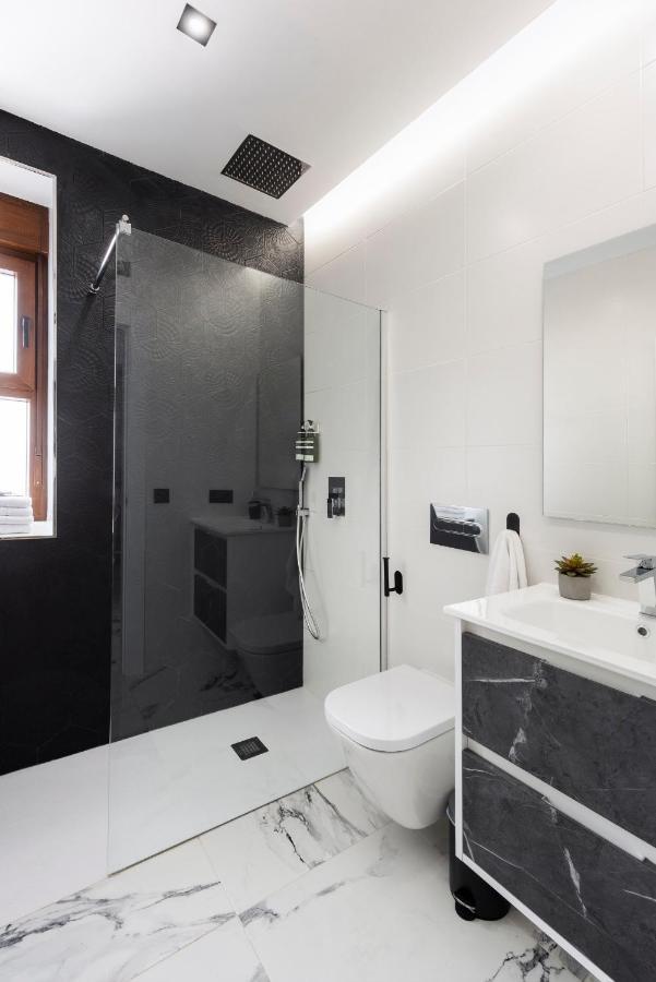Quivir Apartamentos Deluxe Casa Del Arco Andujar Bagian luar foto