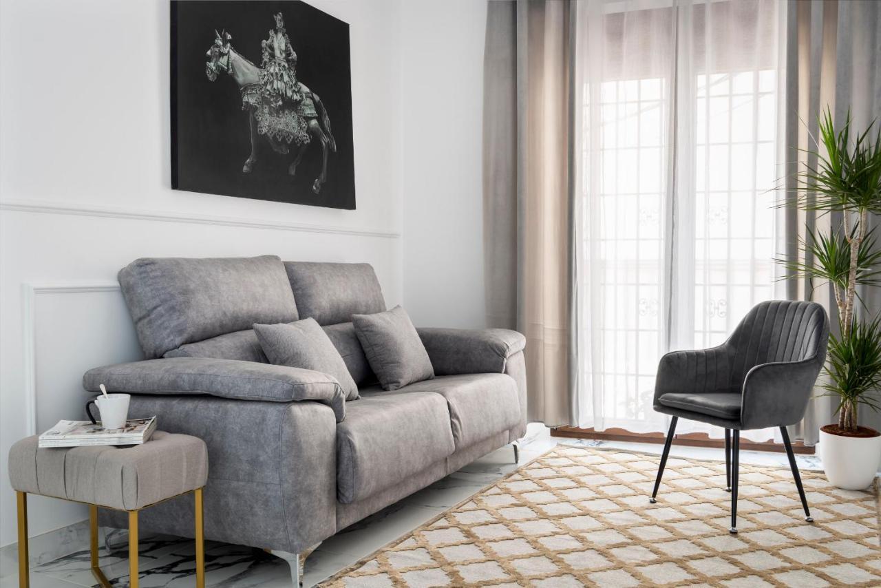 Quivir Apartamentos Deluxe Casa Del Arco Andujar Bagian luar foto