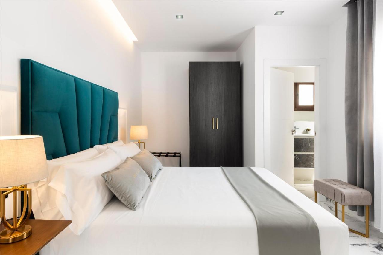 Quivir Apartamentos Deluxe Casa Del Arco Andujar Bagian luar foto