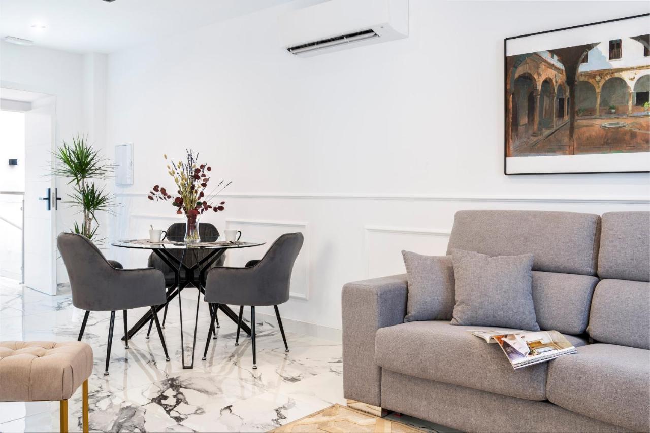 Quivir Apartamentos Deluxe Casa Del Arco Andujar Bagian luar foto