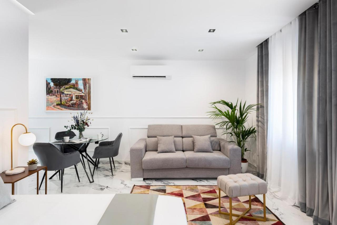 Quivir Apartamentos Deluxe Casa Del Arco Andujar Bagian luar foto