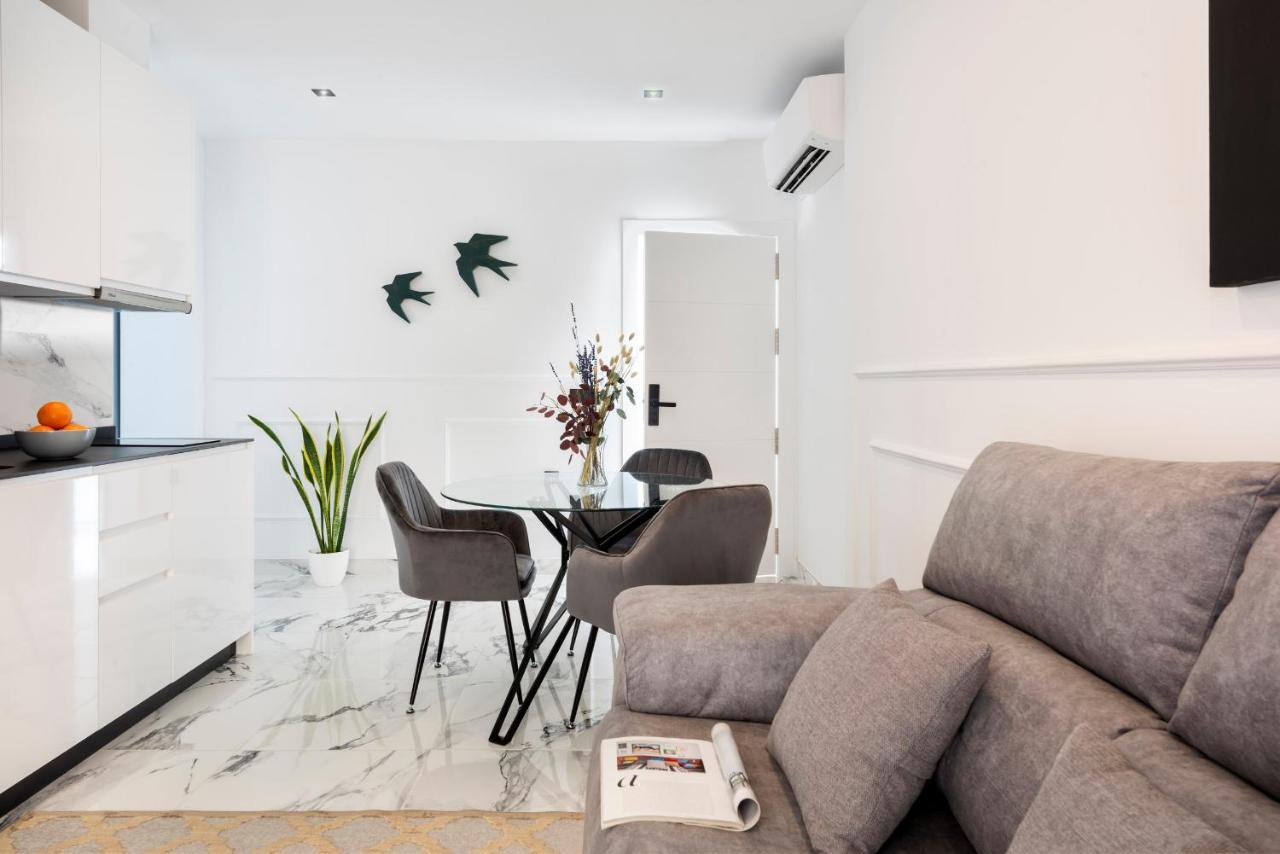 Quivir Apartamentos Deluxe Casa Del Arco Andujar Bagian luar foto