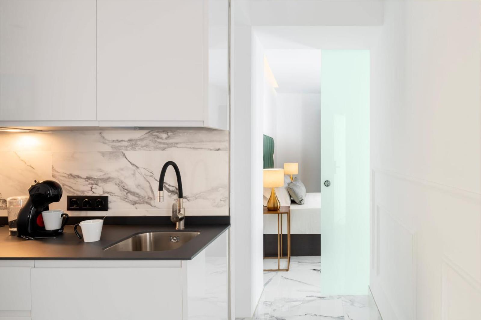 Quivir Apartamentos Deluxe Casa Del Arco Andujar Bagian luar foto